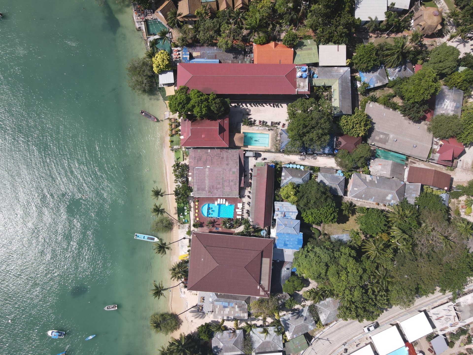 Aerial of a dive-and-stay resort on the Chalok Bay beachfront, Koh Tao